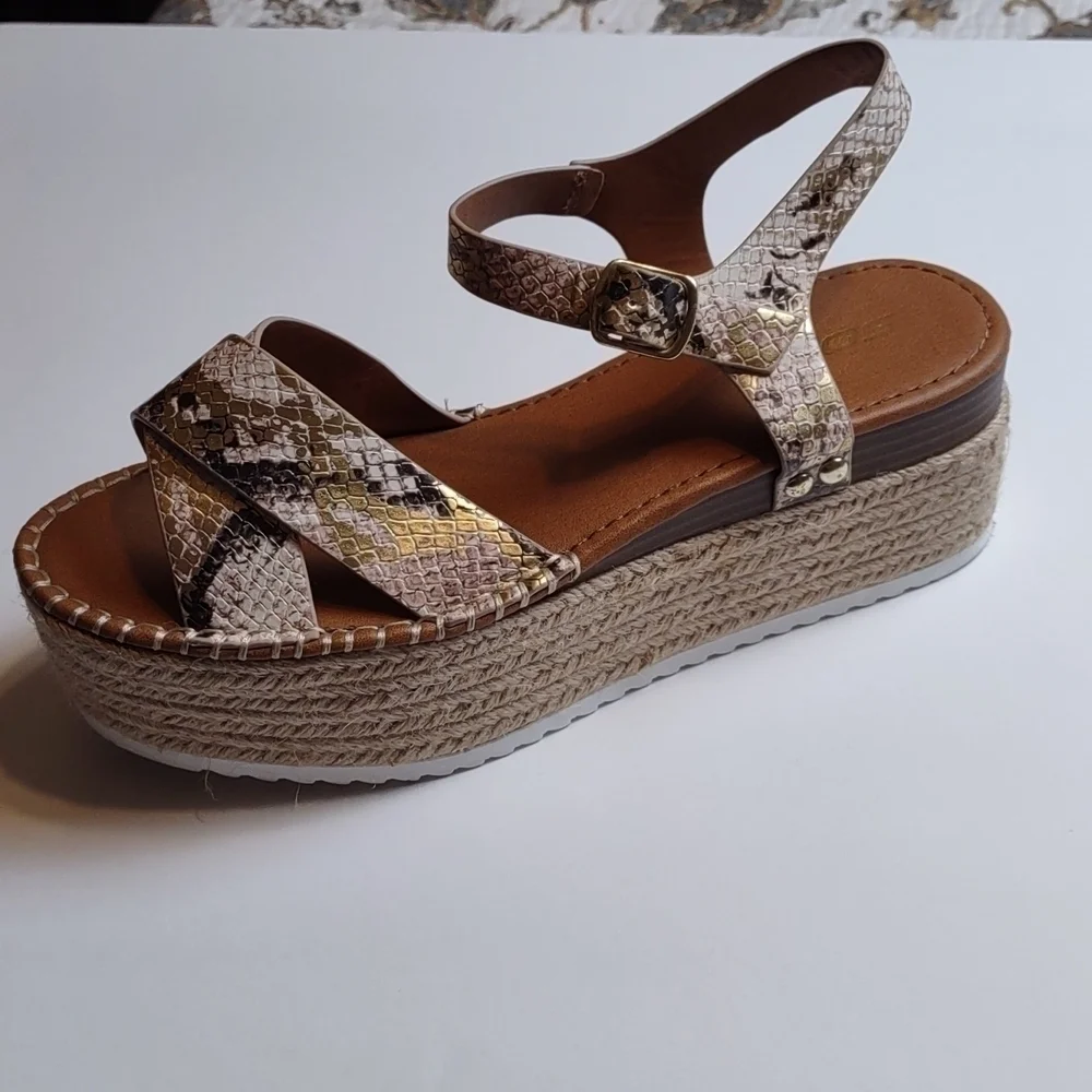 Soda platform snake print sandals